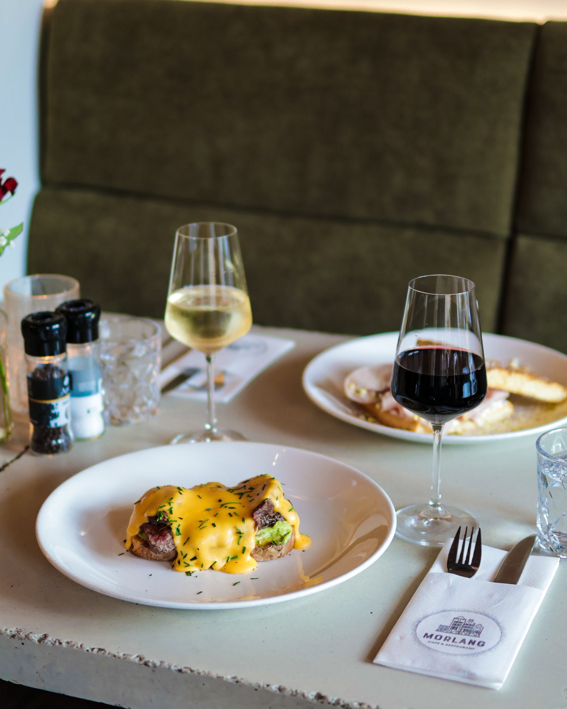 Steak benedict with wine